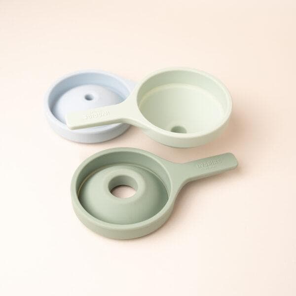 Drie inklapbare Inspire My Play trechters in blauw en groen