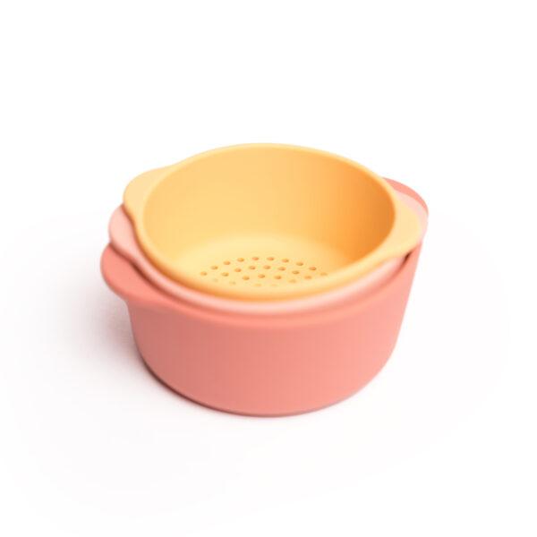 Inspire My Play Nesting Bowls in koraal en geel op elkaar gestapeld