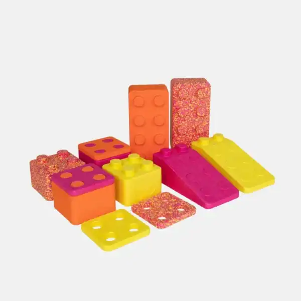 Bygge Farvespil Leni met gele, roze, oranje en gespikkelde bouwstenen