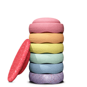 Stapelstein Rainbow Set Pastel Winter Special 2026 met zes pastelstenen en rood gespikkeld balansbord