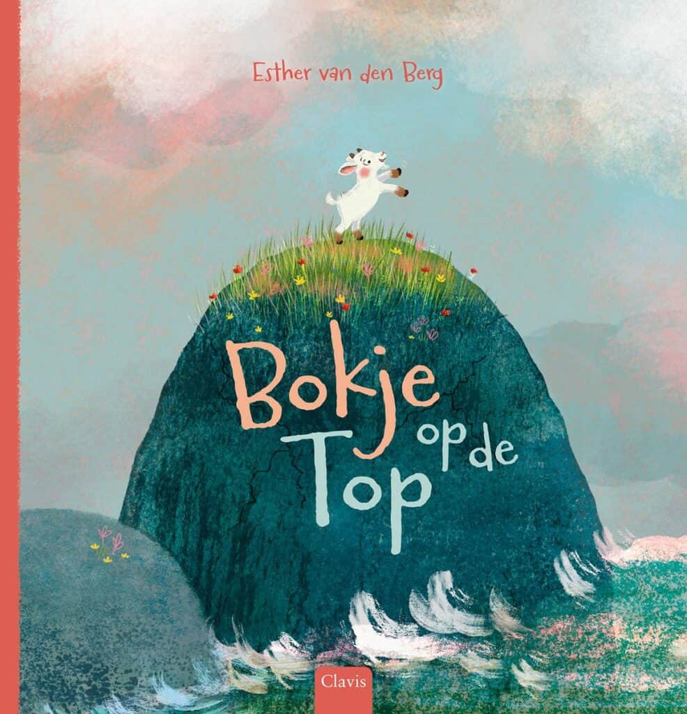 Voorkant van Bokje op de top met het bokje op een hoge rots bij zee